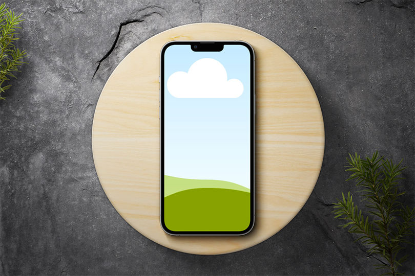 Canva iPhone 13 Pro Mockup on Wood Podium