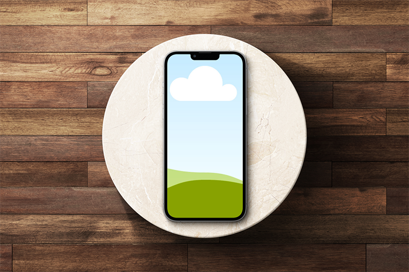 Canva iPhone 13 Pro Mockup on Wooden Background Podium