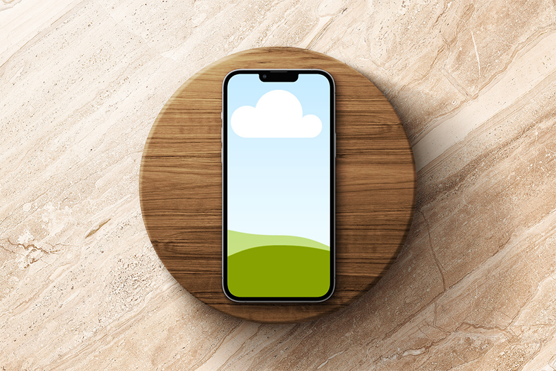 Canva iPhone 13 Pro Mockup on Wooden Podium