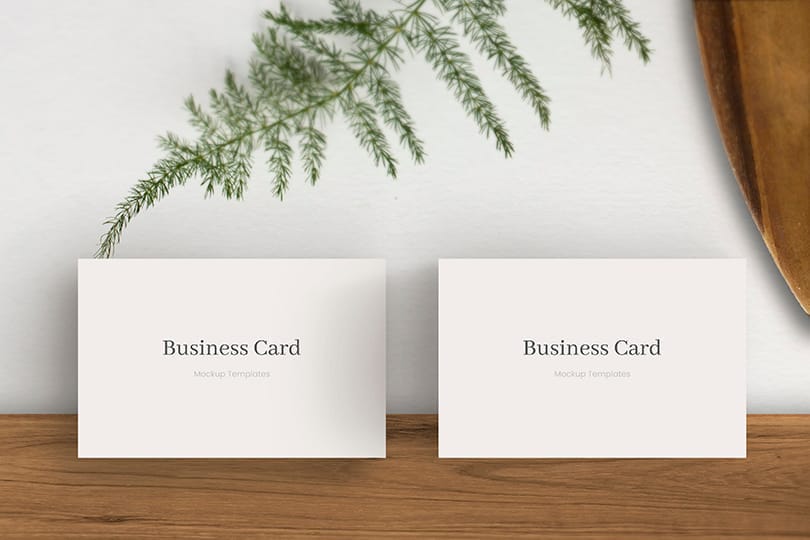 Photoshop Business Card Mockup On White Wall & Desk