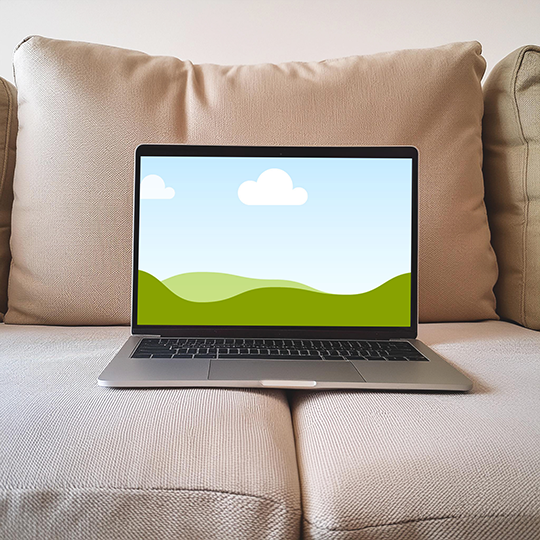 Canva Macbook Mockup on Sofa