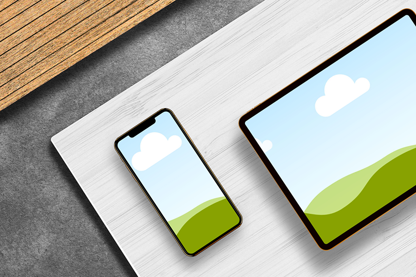 Canva iPhone X and iPad Mockup on Wood Background