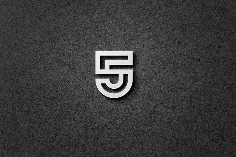 Photoshop Emboss Silver 5 Logo Mockup on Paper Texture