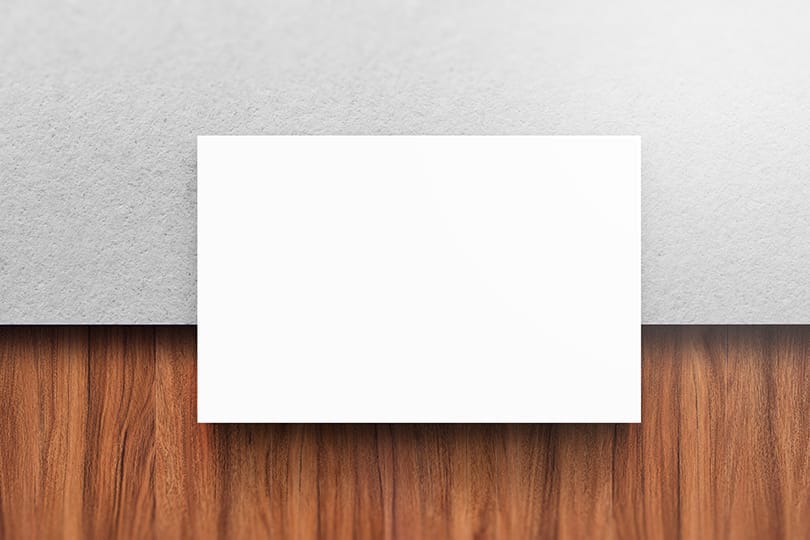 Image Business Card On Paper Texture & Wood Table Mockup