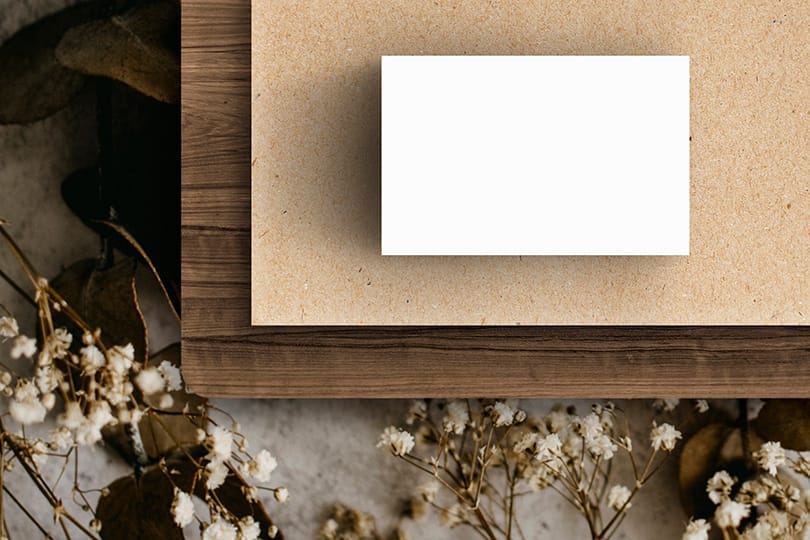 Image Business Card On Table With Twigs Mockup