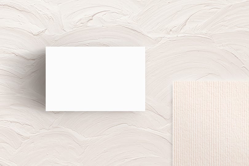 Image Business Card On White Wall Plaster Texture Mockup