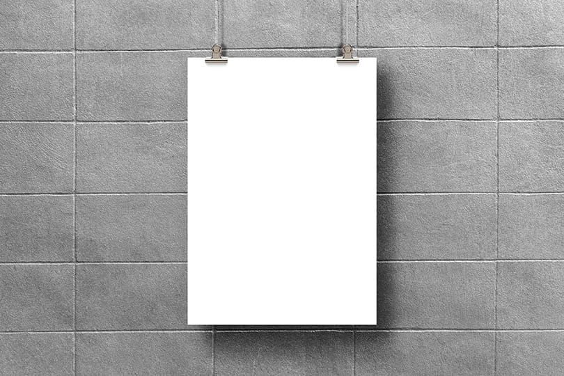 Image Hanging Poster Mockup on Brick Wall