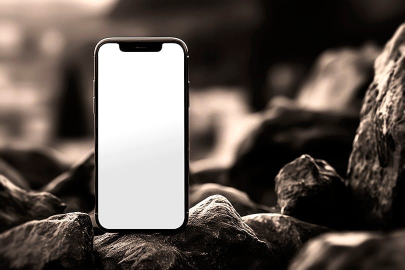 Image Phone Mockup On The Rock Background