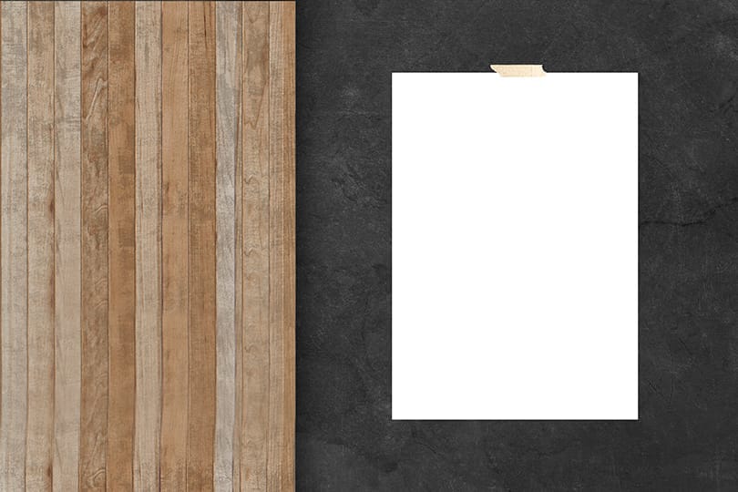 Image Poster Mockup on Black Wall With Wooden Board