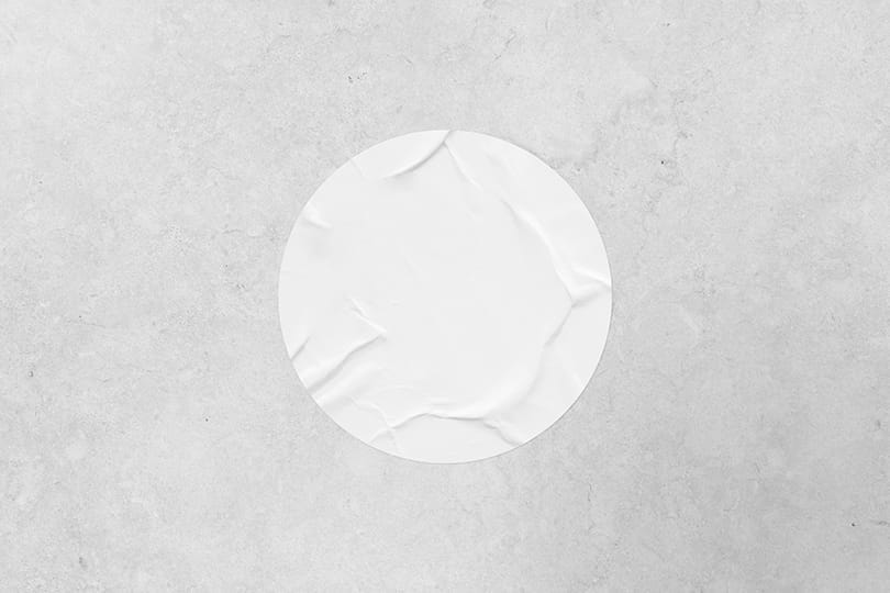 Image Rounded Sticker Mockup on Marble Wall Texture