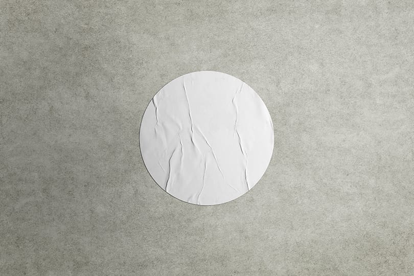 Image Rounded Sticker Mockup on Realistic Wall Texture