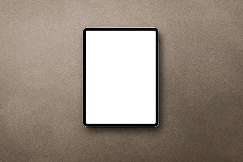 Image iPad Mockup on Brown Leather Surface