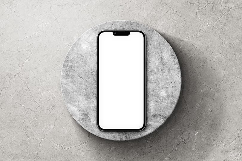 Image iPhone 13 Pro Mockup on Cracked Wall Texture