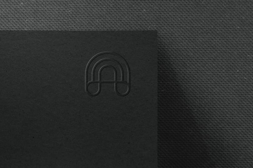 Photoshop Logo Mockup on Black Mate Texture