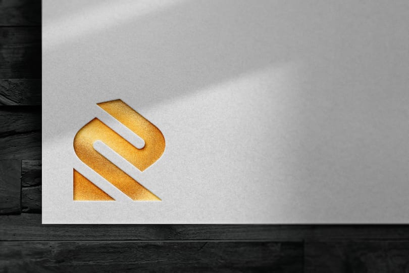 Photoshop Logo Mockup on Black Wood Background