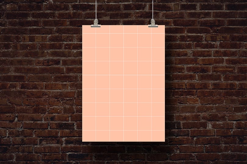 PNG Hanging Poster Mockup on Red Brick Wall