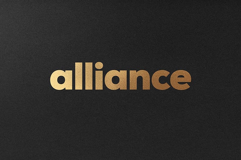 Photoshop Simple Gold Alliance Logo Mockup on Paper