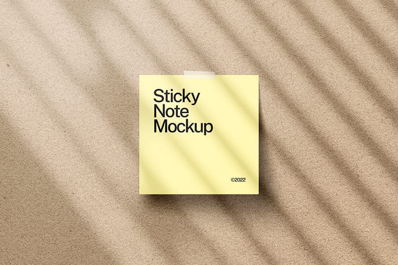 Photoshop Soft Yellow Sticky Note Sticked on Textured Wall Background