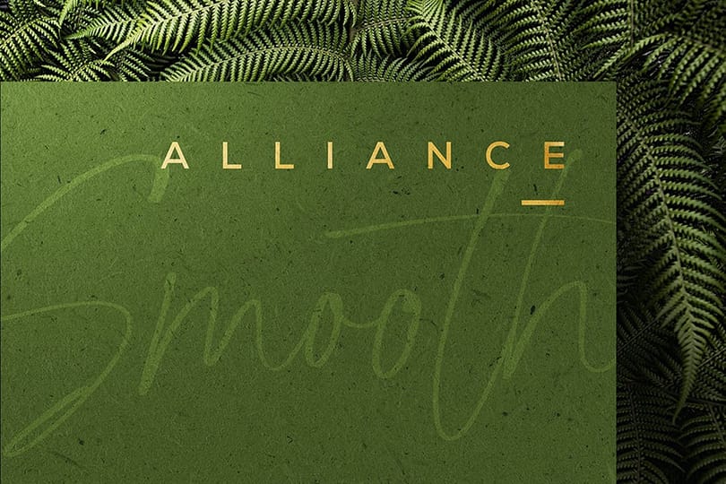 Alliance Gold Paper Logo Mockup on Sword Fern