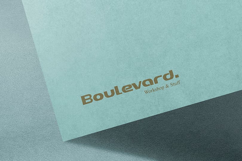 Photoshop Boulevard Logo Paper Mockup on Textured Background