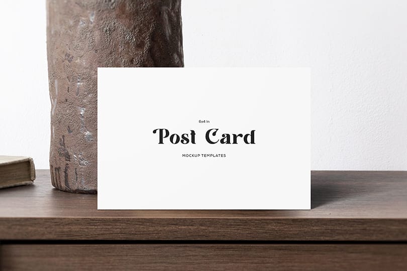 Business Card Mockup on Brown Wooden Desk