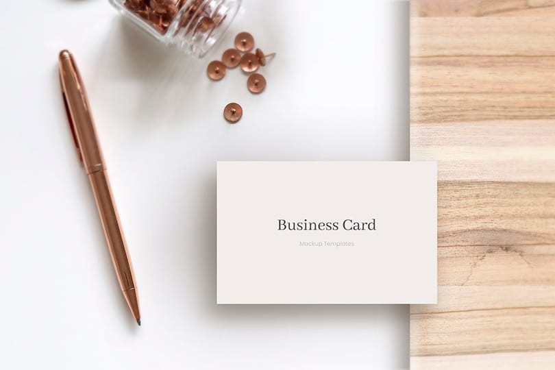 Business Card Mockup on White Background  with Pins and Pen