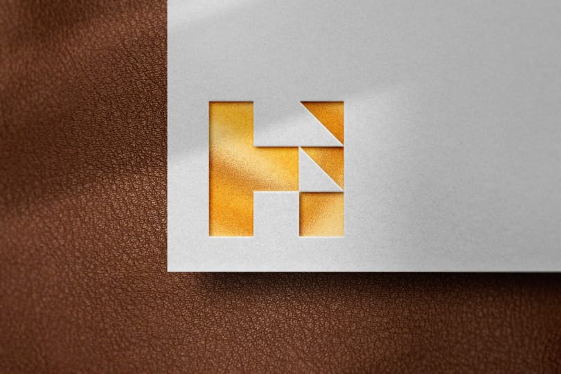 Logo Mockup on Dark Brown Leather Background