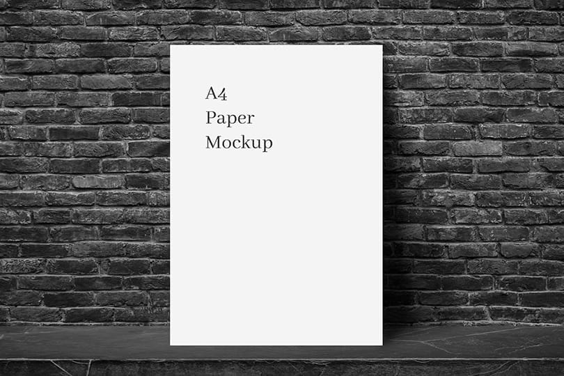 Photoshop Minimal White A4 Paper Mockup with Brick Stone Wall Background