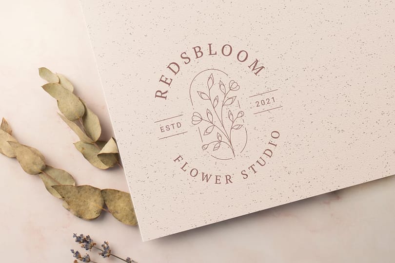 Photoshop Reds Bloom Flower Studio Paper Logo Mockup