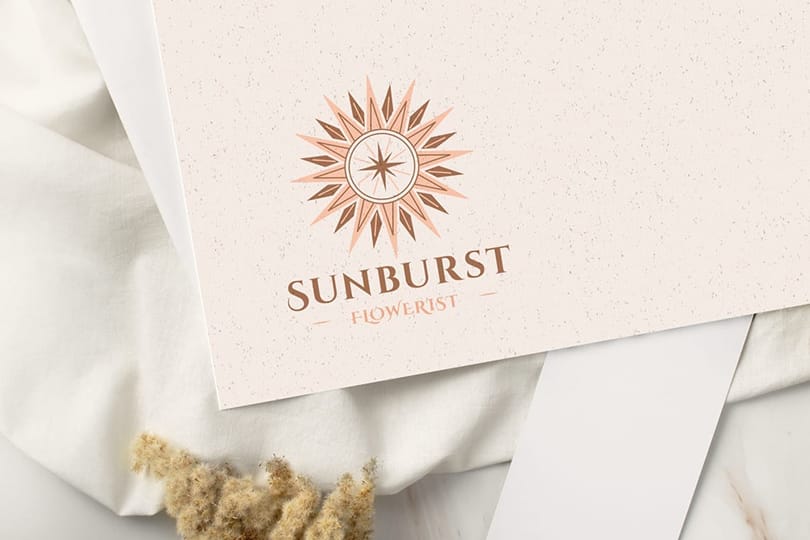 Photoshop Sunburst Flowerist Paper Logo Mockup