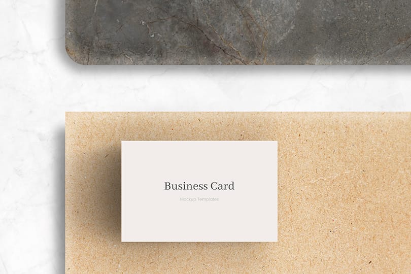 White Business Card Mockup Lay on Textured Ground