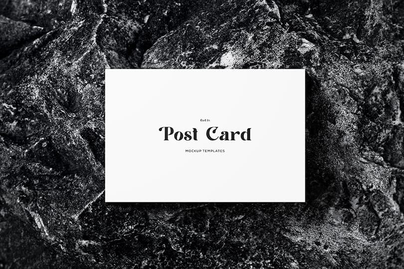 White Postcard Mockup Floating At Rough Stone Texture