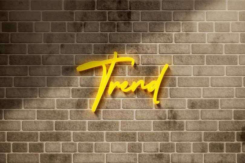 Photoshop Yellow Neon Logo Mockup on Brick Wall