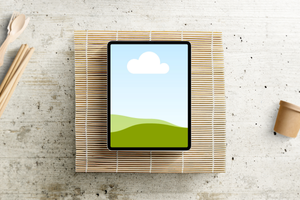 Canva Realistic iPad Pro Mockup on Bamboo Podium