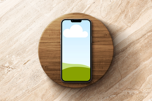 Canva iPhone 13 Pro Mockup on Wooden Podium