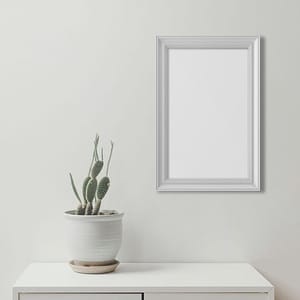 Image Frame Above Table With Vase Mockup