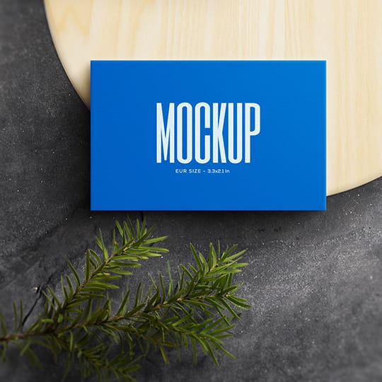 Photoshop Blue Business Card Mockup on Wood Plate with Plant Object