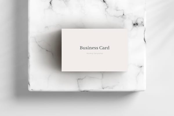 Photoshop Business Card Mockup on White Marble Podium