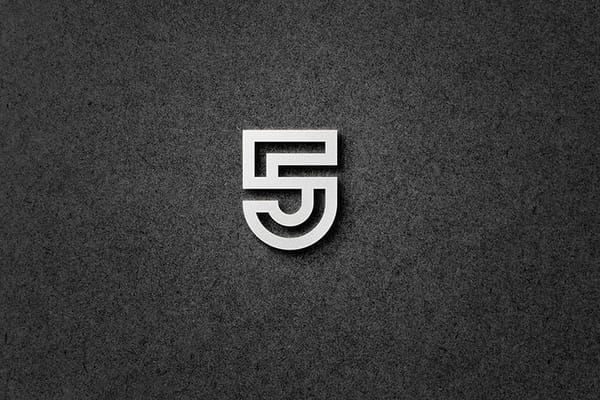 Photoshop Emboss Silver 5 Logo Mockup on Paper Texture