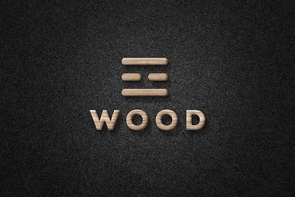 Photoshop Embossed Wood Logo Mockup on Black Paper Texture