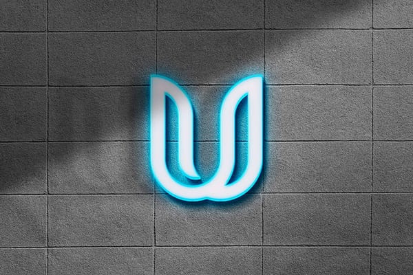 Photoshop Neon U Logo Mockup on Wall