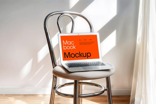 Photoshop Laptop standing on a Chair Mockup